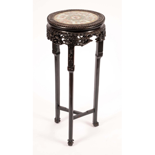 1220 - An 18th century Chinese porcelain mounted hardwood jardiniere stand, circular top with inset panel p... 