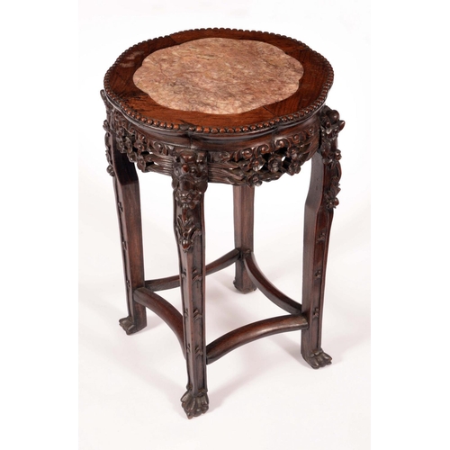 1230 - A Chinese padouk wood jardiniere stand, lobed circular top with inset soapstone panel, beaded border... 