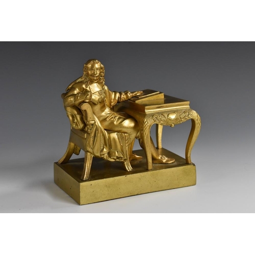 1234 - French School (19th century), a gilt bronze, of Cardinal Mazarin, seated at a writing table, rectang... 