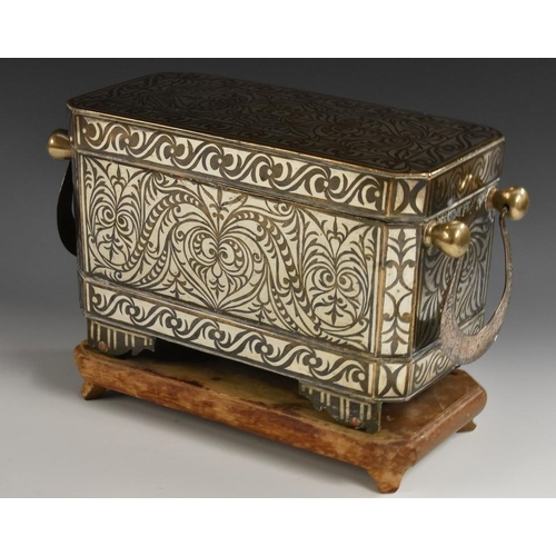 1242 - An unusually large 19th century Maranao silver damascened brass betel box, decorated in the Islamic ... 