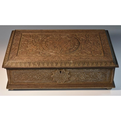 1259 - An Indian iron rectangular box, cast and chiselled overall with scrolling lotus and stylised foliage... 