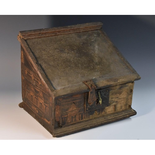 1262 - An Elizabethan/James I oak and marquetry Nonsuch desk box, hinged cover enclosing a till and provisi... 