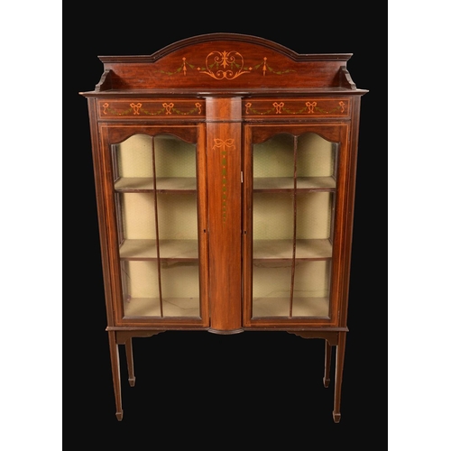 1266 - An Edwardian mahogany and marquetry display cabinet, arched cresting above a pair of glazed doors, i... 