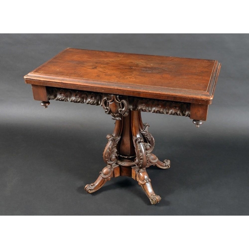 1269 - An early Victorian walnut rounded rectangular card table, moulded top above a deep frieze carved wit... 