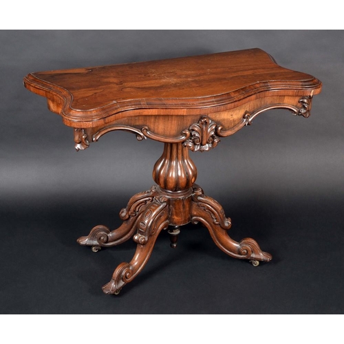 1272 - An early Victorian rosewood serpentine card table, folding top with moulded edge enclosing an inset ... 