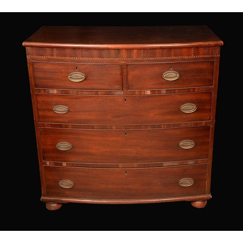 1274 - An early Victorian mahogany bow fronted chest, slightly oversailing top above two short and three lo... 