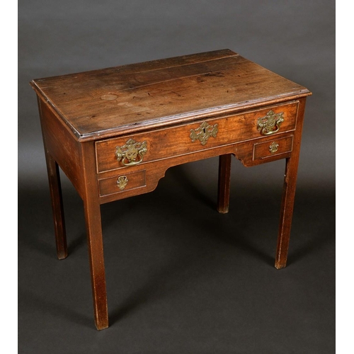 1277 - An early George III mahogany lowboy, rectangular moulded top above a cockbeaded frieze drawer, shape... 