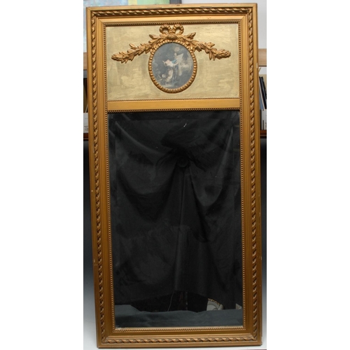 1283 - An early 20th century rectangular mirror, with ribbon tied cartouche above the rectangular plate, be... 