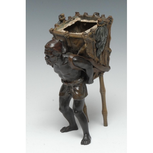 1291 - An early 20th century Austrian cold-painted and brown patinated bronze table centre, cast as Blackam... 