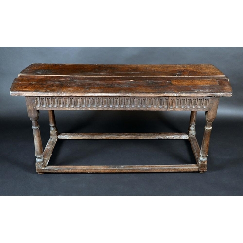 1295 - An early 18th century oak rectangular table base, nulled frieze, turned legs, rectangular stretchers... 