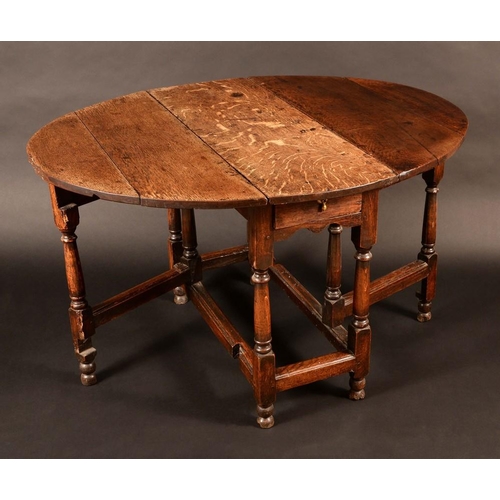 1298 - An early 18th century oak gateleg table, oval top, turned legs, 70cm high, 94.5c wide, c.1720