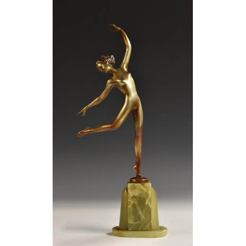 1302 - Josef Lorenzl (1892 - 1950), a silvered bronze, of an Art Deco nude dancer, geometric green onyx pli... 