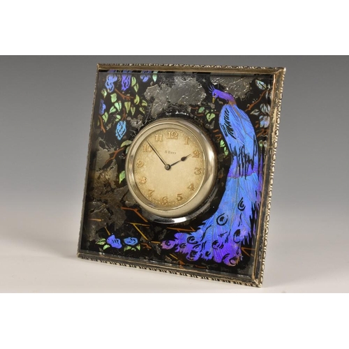 1314 - An Art Deco silver-mounted verre églomisé boudoir timepiece, 4cm dial applied with Arabic numerals, ... 