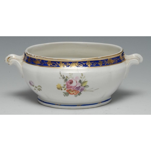 132 - A Chelsea Derby two handled sauce tureen, decorated with floral spray, banded in blue and applied wi... 