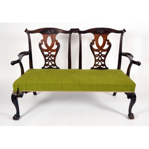 1351 - An Irish Chippendale design mahogany chair back sofa, cupid bow cresting rails, shaped and pierced s... 