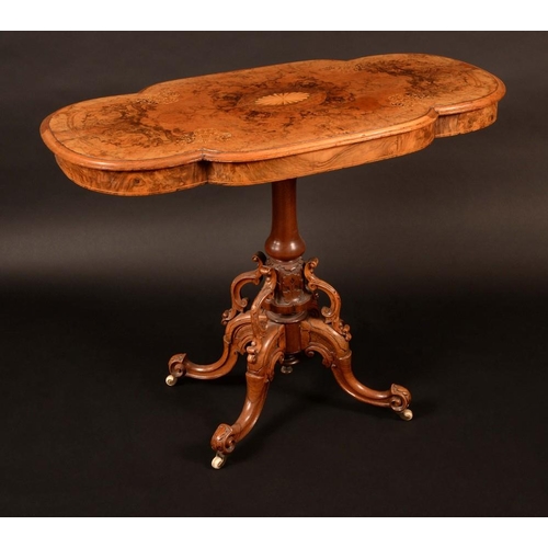 1354 - A Victorian walnut and marquetry occasional table, quarter veneered top inlaid with an oval batwing ... 