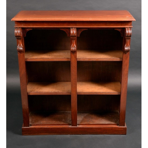 1366 - A Victorian mahogany open bookcase, rectangular moulded top above adjustable shelves flanked by scro... 