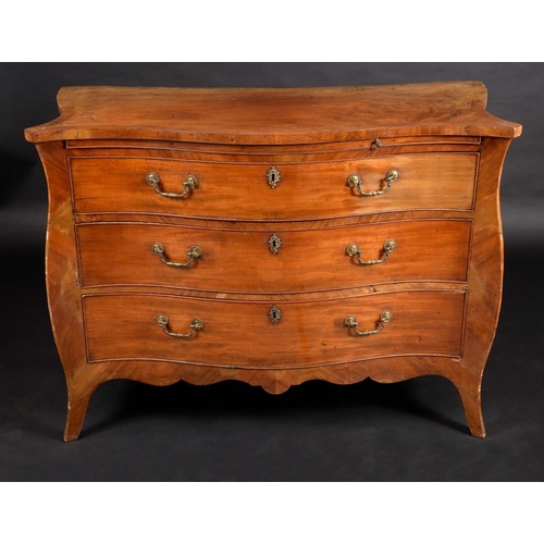 1379 - A George III Chippendale period mahogany serpentine chest, oversailing crossbanded top above a slide... 