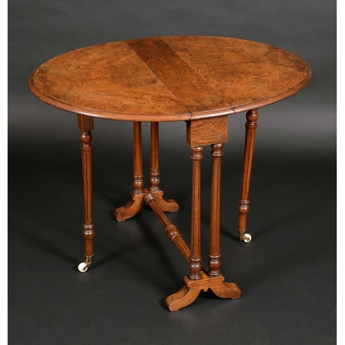 1385 - A Victorian burr walnut oval Sutherland table, by Edwards & Roberts, paper label, well figured top, ... 