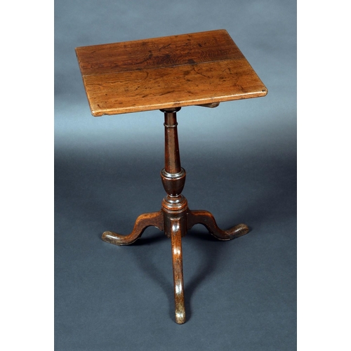 1407 - A small George III oak rectangular tripod occasional table, tilting top, turned urnular column, cabr... 