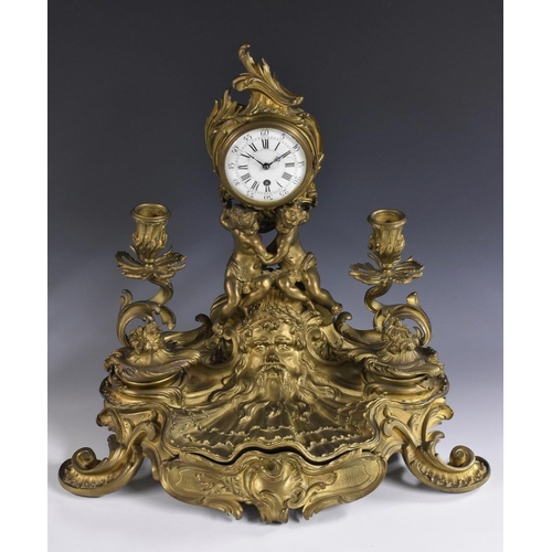 1417 - A sculptural 19th century French gilt metal combination desk stand and timepiece, 7cm circular ename... 