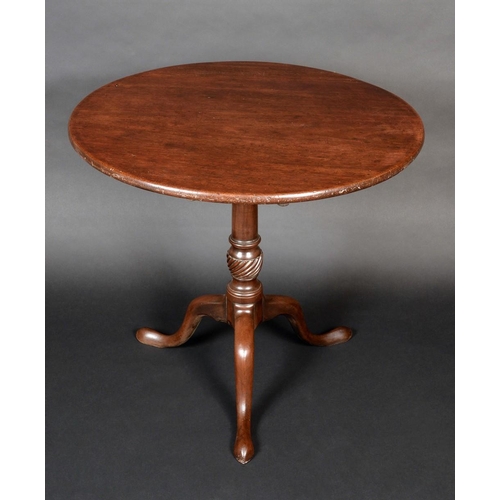 1422 - A George III mahogany tripod occasional table, circular tilting top, turned spirally fluted baluster... 