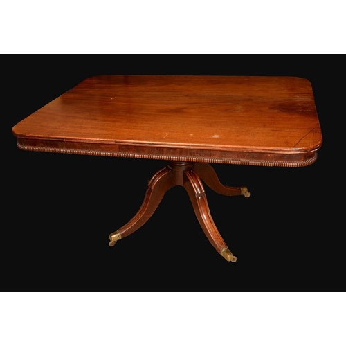 1431 - A post-Regency mahogany rounded rectangular breakfast table, moulded top above a deep beaded frieze,... 