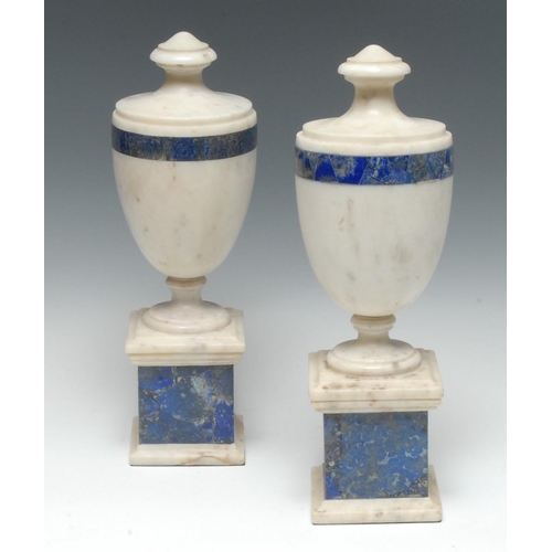 1449 - A pair of Grand Tour-type lapis lazuli and white marble library urns, of Neoclassical design, square... 