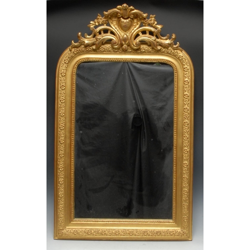 1688 - A 19th century gilt framed mirror, with lofty foliate cresting, 94cm x 57cm