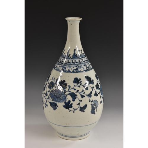 295 - A Chinese bottle vase, decorated in underglaze blue with scrolling lotus and foliage, 42cm high, 17t... 