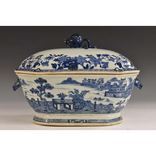 303 - A Chinese canted rectangular tureen and cover, decorated in underglaze blue with fence, pagodas, roc... 