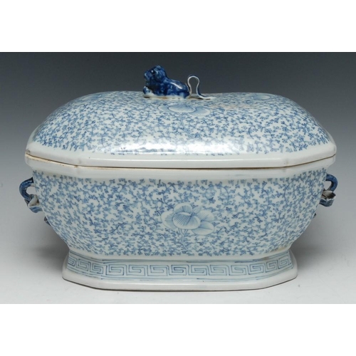 305 - A Chinese canted rectangular tureen and cover, painted in tones of underglaze blue with flowers amon... 