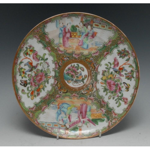 306 - A Chinese Cantonese plate, painted in the famille verte palette with alternating panels of figures a... 