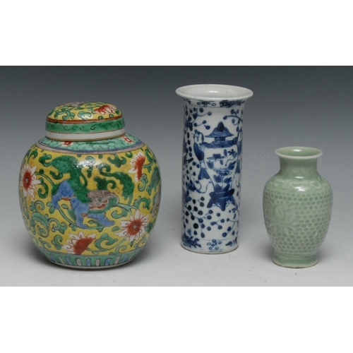 345 - A Chinese sleeve vase, painted in tones of underglaze blue with figures beside temple jars, amongst ... 