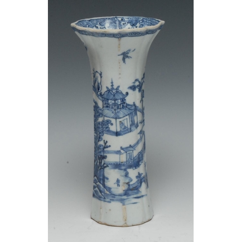 351 - An early 18th century Chinese Export porcelain lobed vase, painted in underglaze with a stylized riv... 