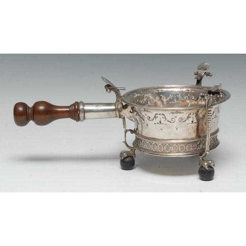 496 - A 17th century silver brazier, spoon-shaped rests on 'Onslow' supports, the flared side pierced with... 