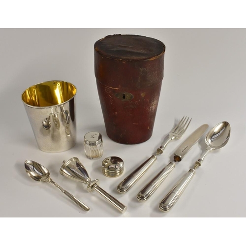 510 - A George III silver gentleman officer's campaign dining set, comprising oval beaker, knife, fork, sp... 