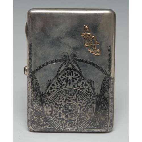 589 - A Russian silver and niello rounded rectangular cigarette case, hinged cover applied with a gold col... 