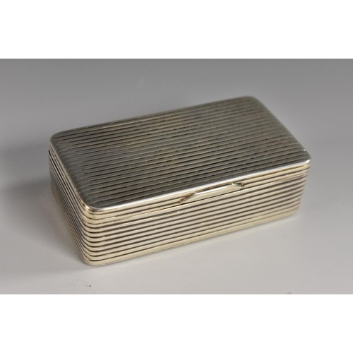 591 - A Russian silver rounded rectangular snuff box, reeded overall, hinged cover, 7cm wide, maker AAC, M... 