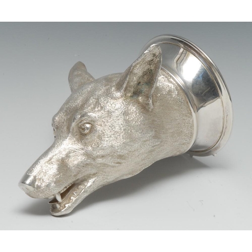 597 - A substantial Elizabeth II cast silver stirrup cup, as the head of a fox, flared rim, gilt interior,... 