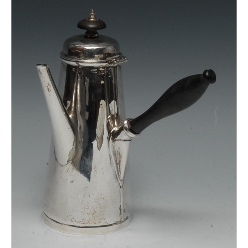 664 - An Irish silver conical chocolate pot, hinged domed cover with knop finial, turned fruitwood handle,... 