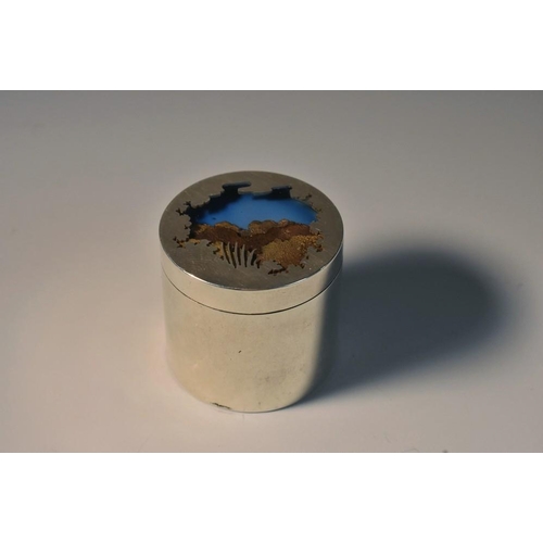 667 - An unusual Elizabeth II silver cylindrical pill box, the push-fitting cover set with mineral samples... 