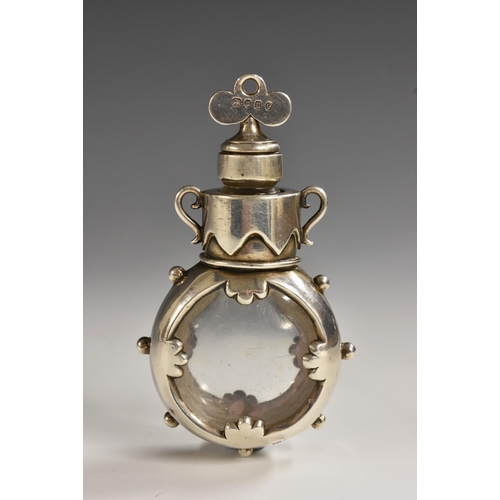 669 - An unusual Victorian silver and clear glass flask shaped scent bottle, trefoil stopper, shaped mount... 