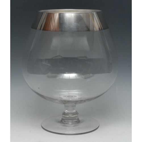 671 - An unusually large silver mounted brandy glass, quite plain, spreading circular base, 30.5cm high