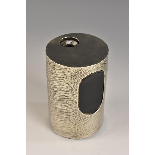 678 - Modern Design - an Elizabeth II silver cylindrical table lighter, bark textured, 9cm high, George Gr... 