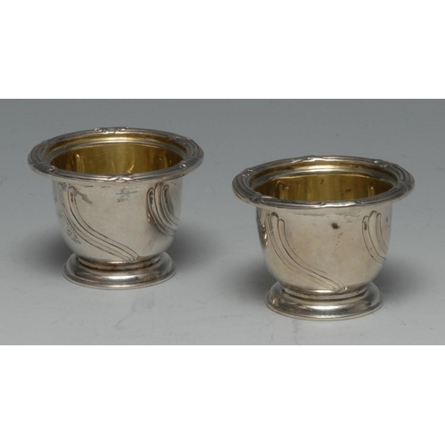 683 - Paul Storr - a pair of William IV silver urnular salts, gilt interiors, wrapped reeded rims above wr... 