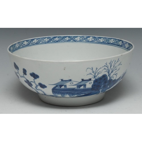 70 - A Worcester Precipice pattern bowl, painted in underglaze blue with huts, trees and foliage, the int... 