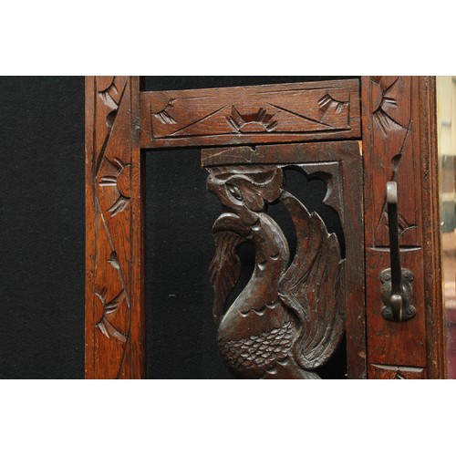 391 - A Victorian carved oak hall stand, 212cm high, 106cm wide.  c.1880