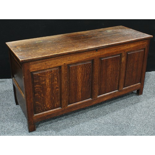 400 - A 19th century oak four-panel blanket chest, hinged top, stile feet, 76cm high, 151.5cm wide, 54cm d... 