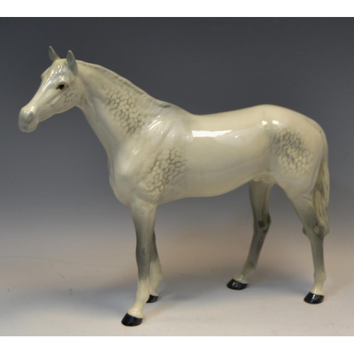 84 - A Beswick dapple grey mare, standing, 29cm high, printed mark